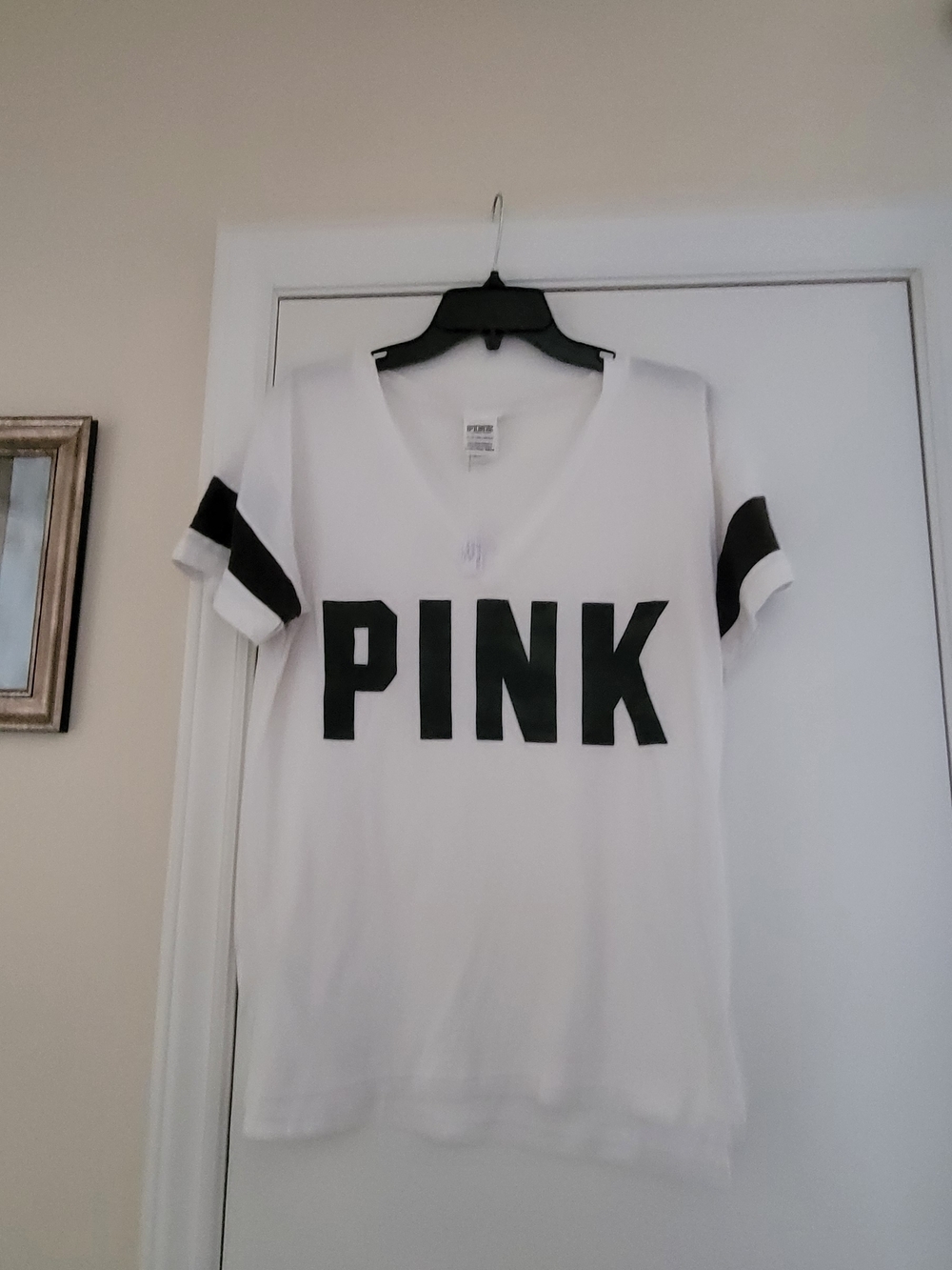PINK Victoria's Secret White V-Neck Tee with Black Logo and Sleeve Stripes